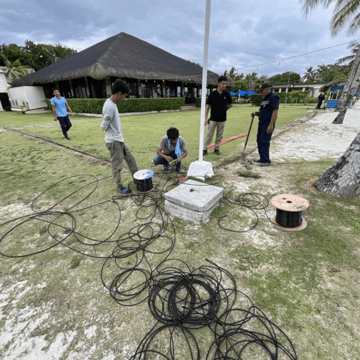 14 person fixing wires