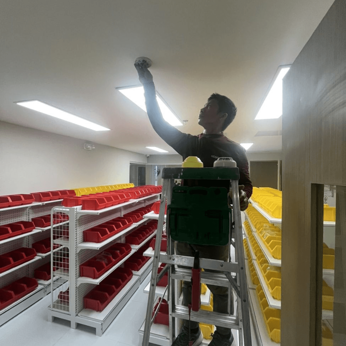 2 person installing fdas