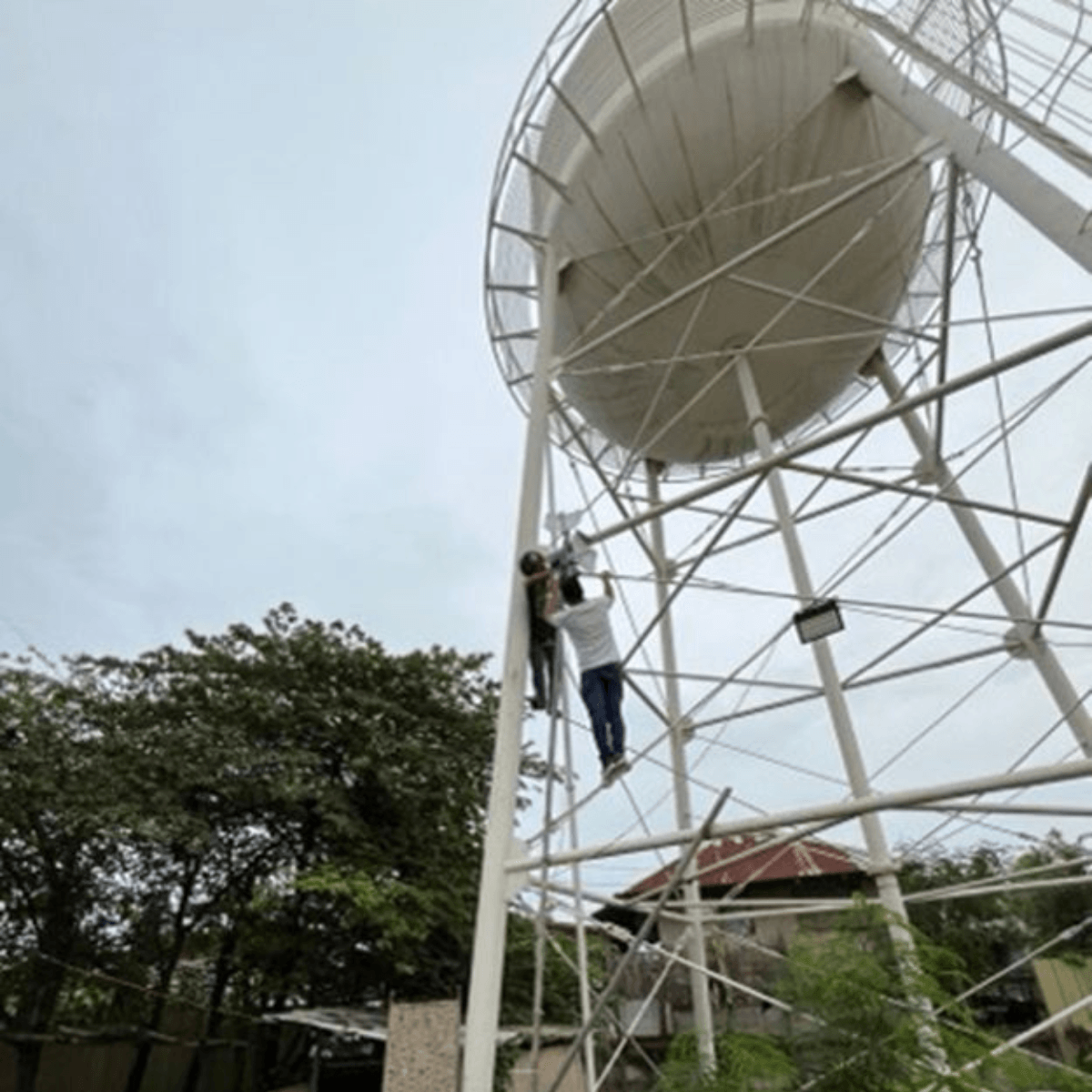 6 persons on tower